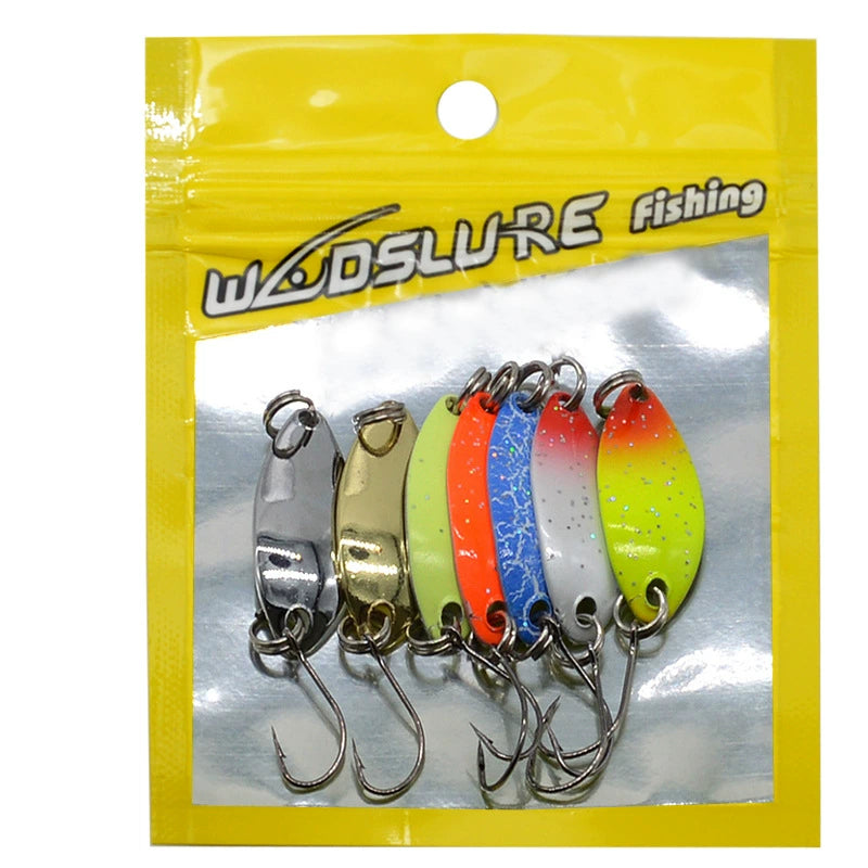 Packaged spoon lures showing metal spoons with single hooks in silver, gold, orange, blue, green
