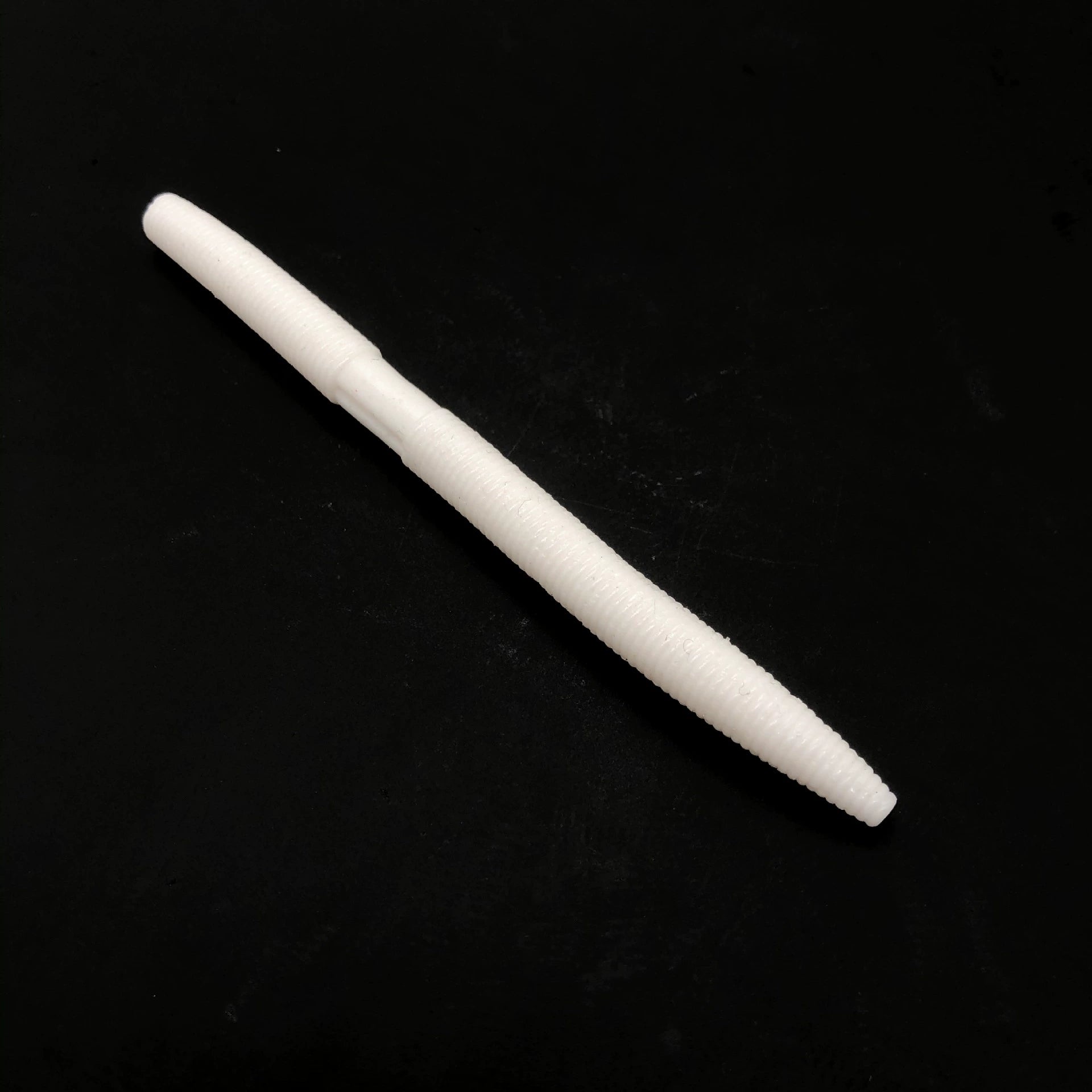 White soft plastic stick bait worm, 5 inch length