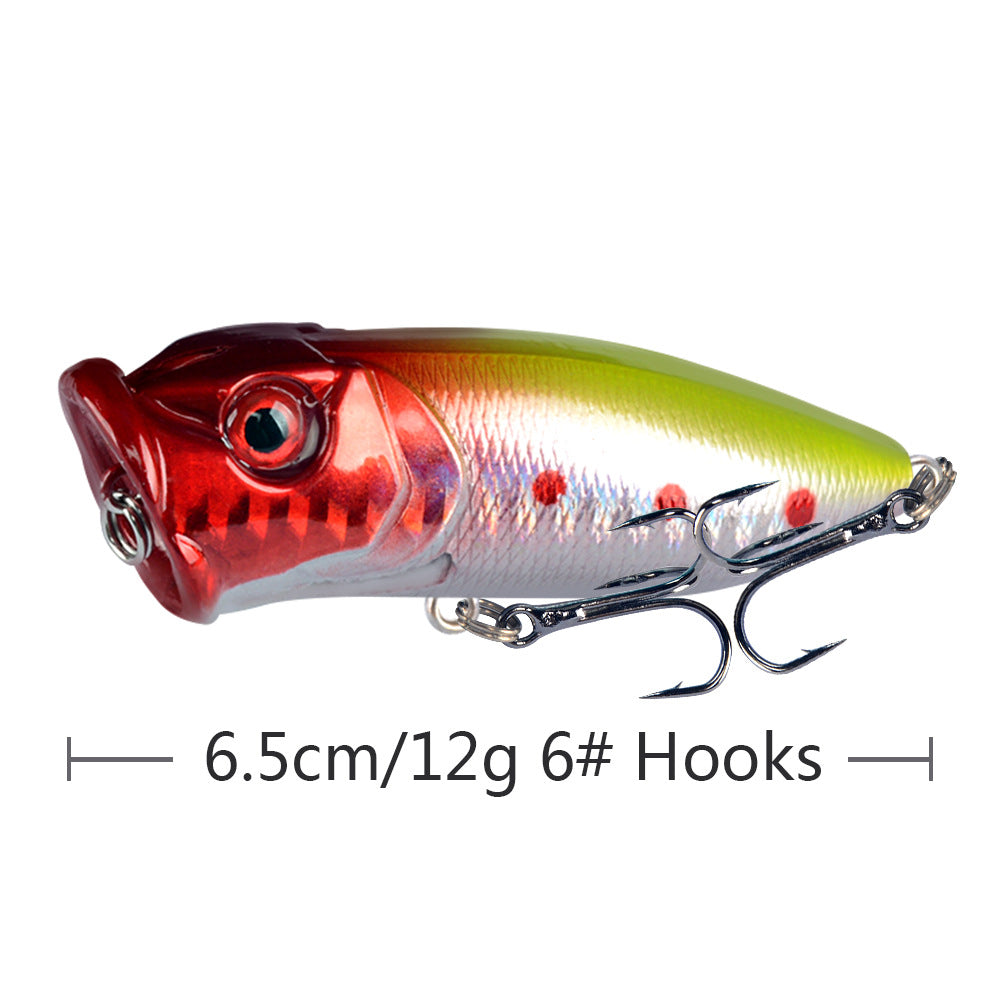 Red and silver topwater popper lure with treble hooks, 3D eye and scale pattern