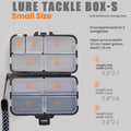 Small lure tackle box, dark case with clear compartments and 9 section layout