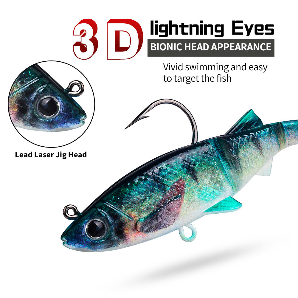 Fish-shaped soft swimbait jig lure with 3D-style eye and teal-blue body, curved hook