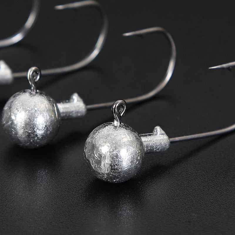 Set of weedless jig head hooks, round lead balls on curved hooks