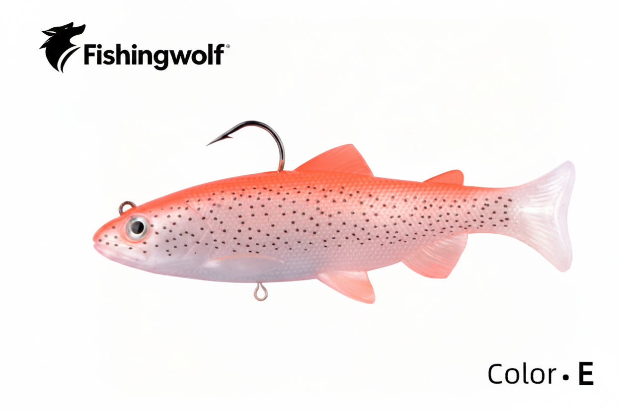 Soft plastic swimbait lure with jig hook, orange-pink speckled fish body