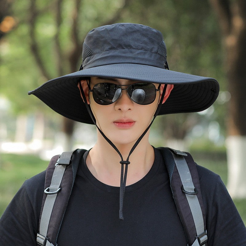 Wide-brim boonie sun hat in dark color with chin cord and curved brim